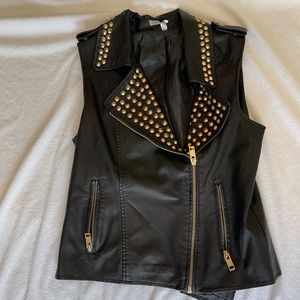 leather vest with gold studs